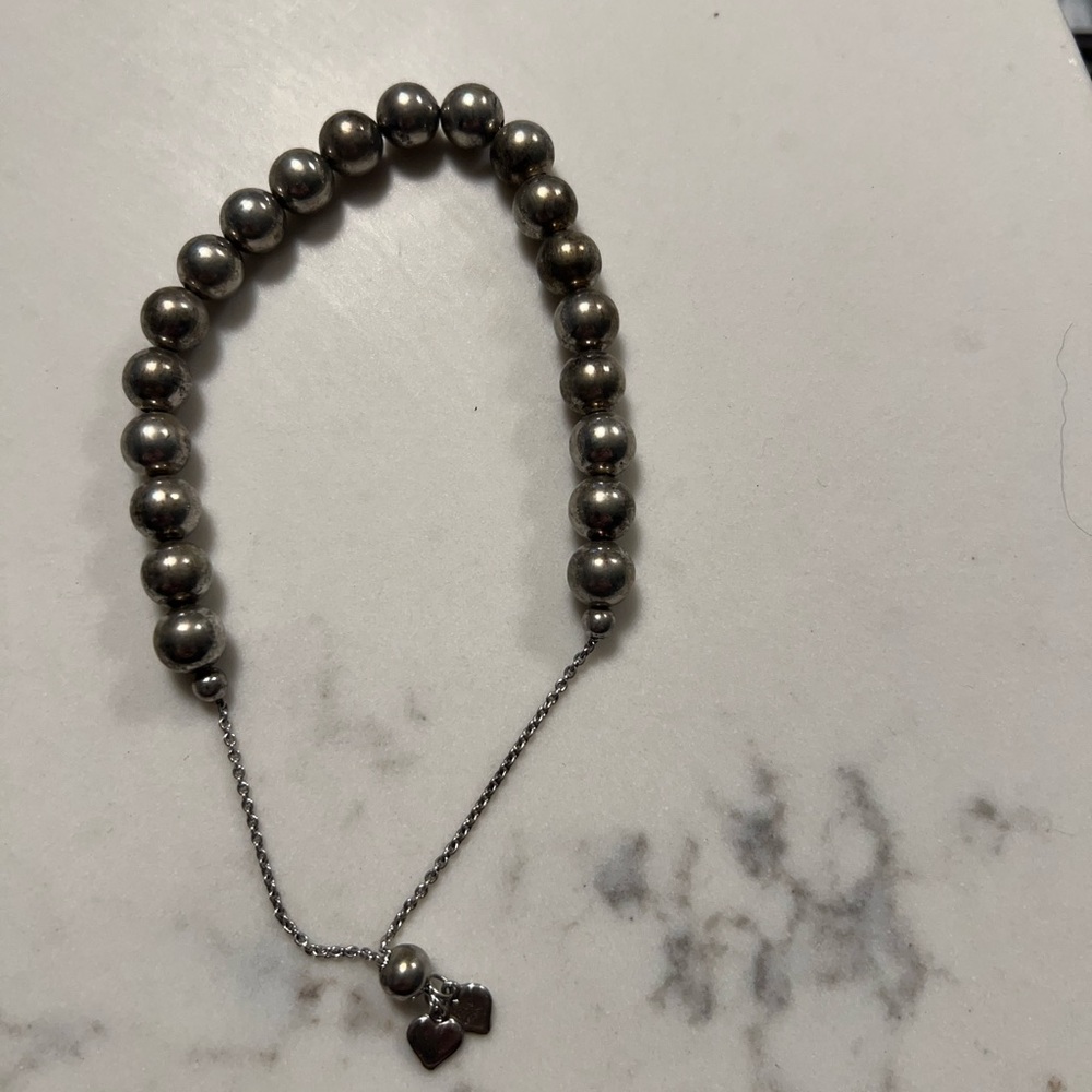 Elegant Silver Beaded Bracelet with cute heart detail